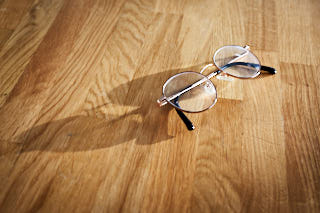 Glasses on a wooden table.