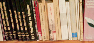 Shelf full of books.